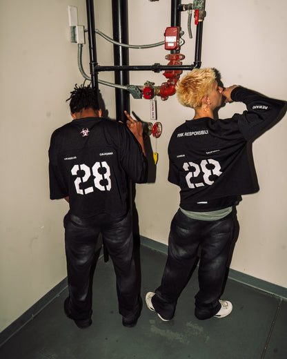 reward + risk cropped varsity jersey