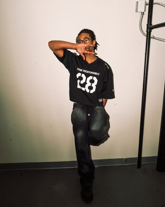 reward + risk cropped varsity jersey