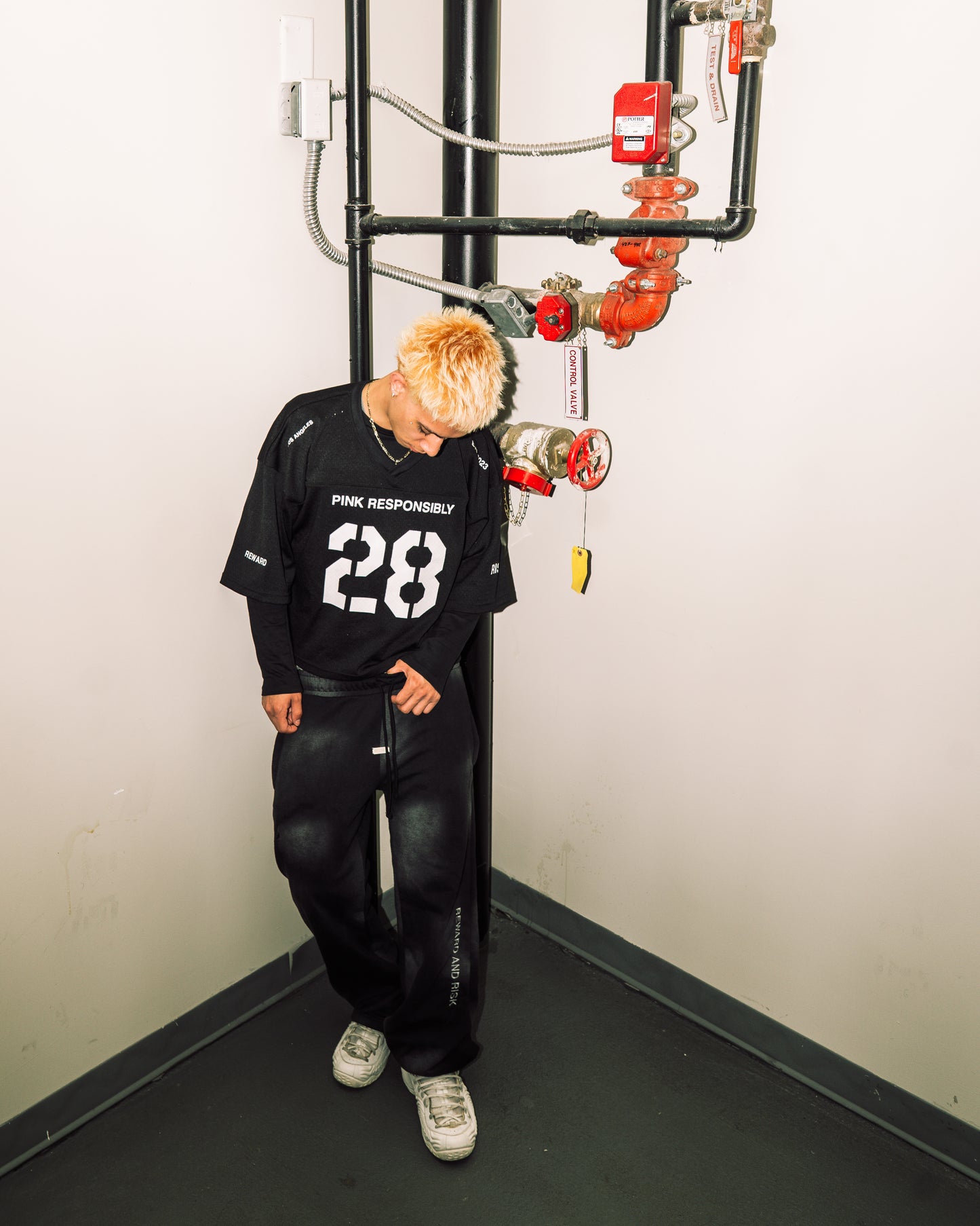 reward + risk cropped varsity jersey