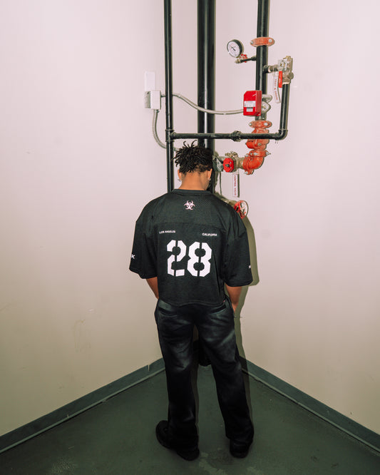 reward + risk cropped varsity jersey