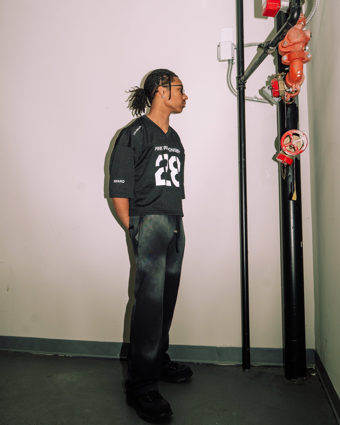 reward + risk cropped varsity jersey
